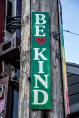 public sign that says be nice