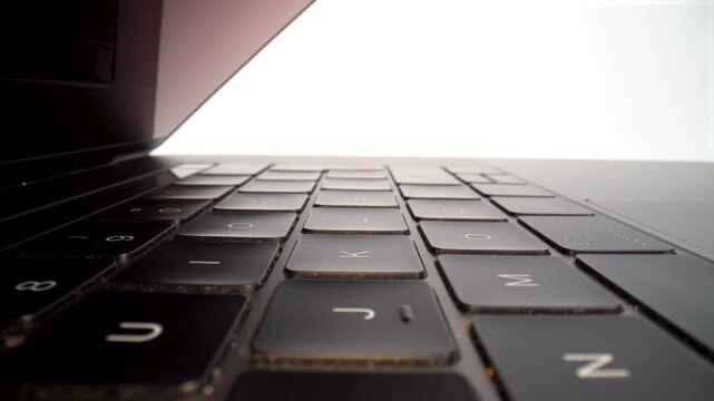 Macro of laptop keyboard keys on white background isolated