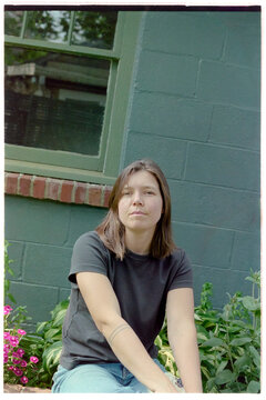 Woman sitting in the backyard