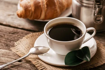 Fototapete Rund Cafe Hot coffee and pastries on a wooden background  © zadorozhna