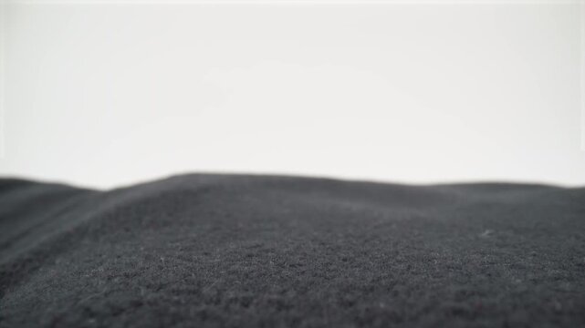 Close up of polyester fabric on white background isolated