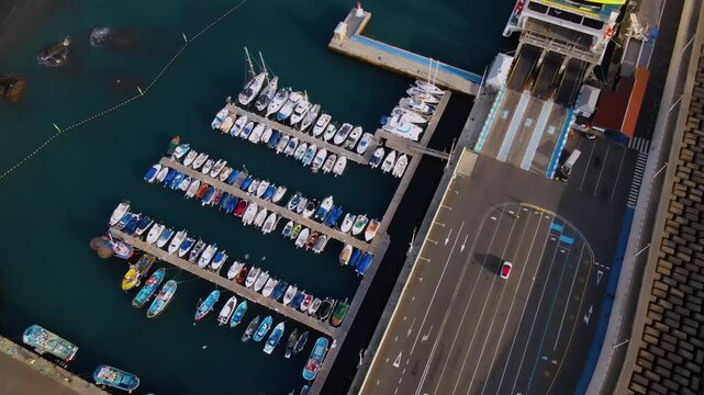 Large commercial ferry docked in port for loading operations