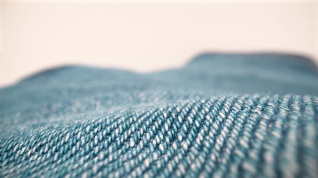 Close up of trouser fabric on white background isolated