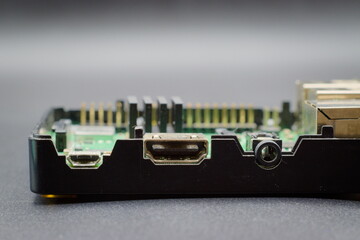 close up of printed circuit board with electronic components 