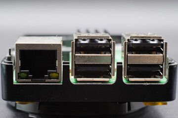 close up of printed circuit board with electronic components 