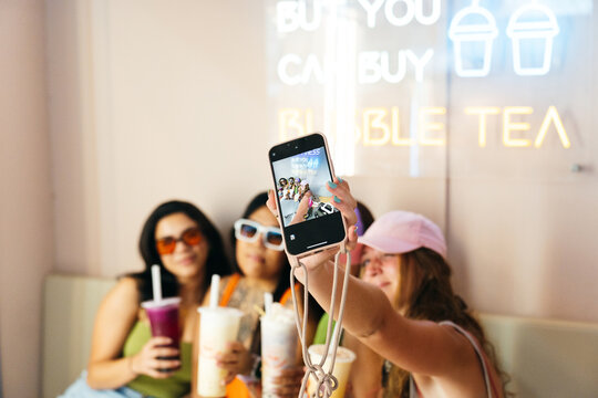 Friends Enjoying Bubble Tea Together