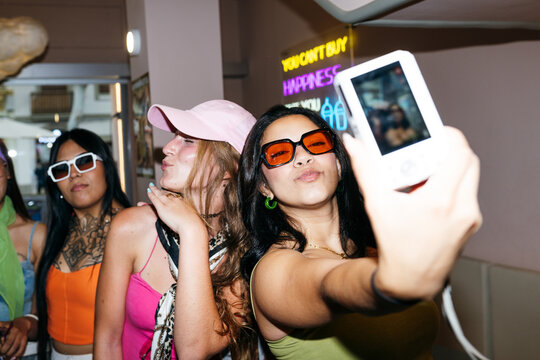 Friends Taking a Group Selfie