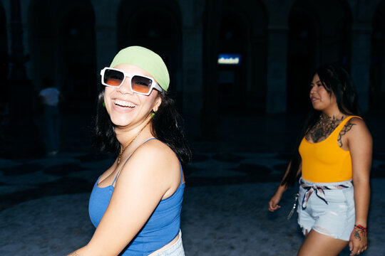 Friends Enjoying Outdoor Night Downtown