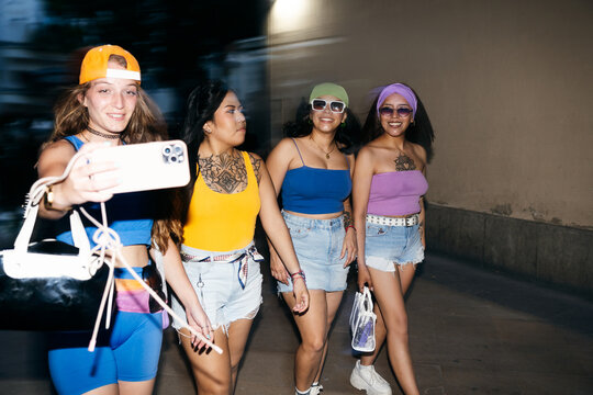 Friends Walking and Posing Together