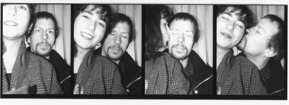 Couple in an automatic photo booth