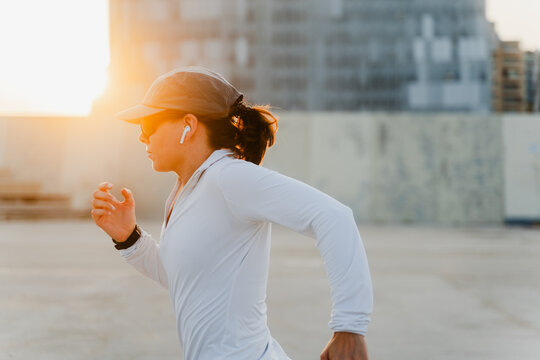 Woman training at sunset