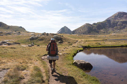 Backpacker Walking Mountain Trail