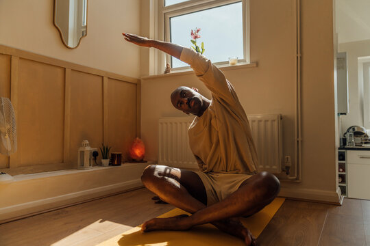 Seated Side Stretch by Window