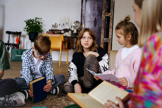 Teacher reads with a group of children