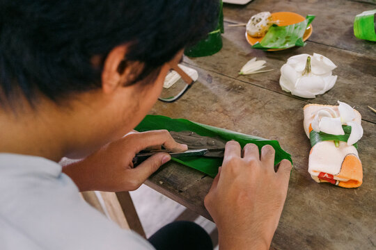Handmade Buddha amulet from clay in a cultural workshop in Thailand