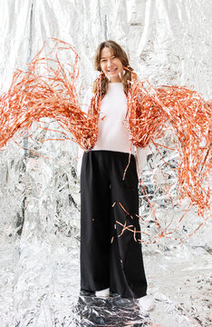 Girl with tinsel in her hair