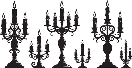Obraz premium Silhouette of various candelabras with lit candles on stands