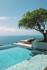 Obraz premium On a bright, sunny day, there's a stunning view of a sparkling swimming pool with crystal-clear water, accompanied by a lush tree and a comfortable lounge chair.