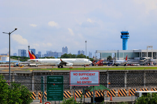 Manila, Philippines - 2025 July 13: A Philippine Airlines Airbus A321 aircraft (registration RP-C9924) taxis at Ninoy Aquino International Airport.