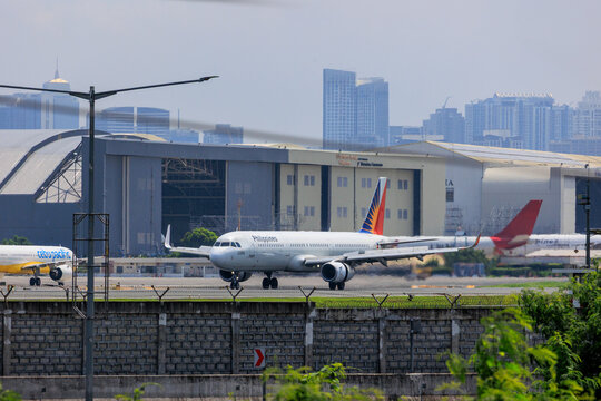 Manila, Philippines - 2025 July 13: A Philippine Airlines Airbus A321 aircraft (registration RP-C9924) taxis at Ninoy Aquino International Airport.
