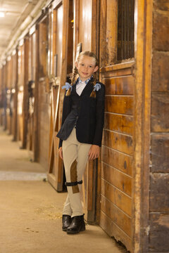  Girl portrait in horse barn 