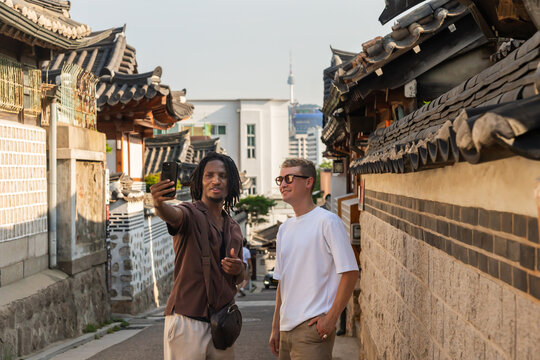 Tourist In Seoul, Taking A Selfie With Namsan Tower View