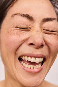 Closeup of a woman's laughing face