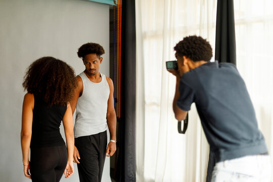 Models Engage in a Photoshoot 