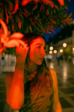 Portrait Under Red And Urban Lights