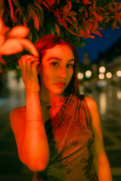 Portrait Under Red Streetlights