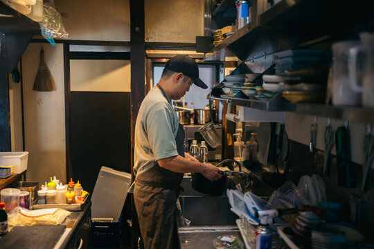 Japanese cook working in the kitchen