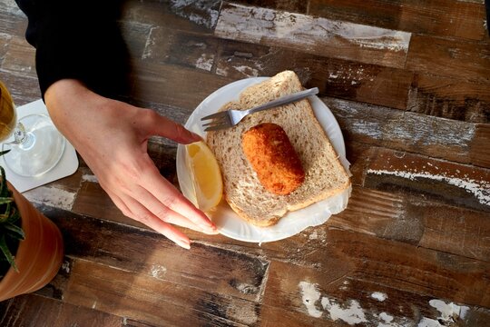 Delicious Snack Served on a Plate With Fresh Lemon Slice