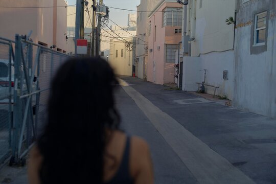 Walking Through a Quiet Urban Alley in the City