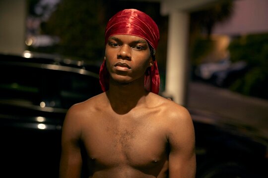 Young Man Posing Confidently in the Evening Light