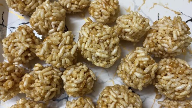 homemade murmura laddu sweet snack made from puffed rice and jaggery