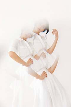 Stylish woman performing contemporary dance with multiple exposure