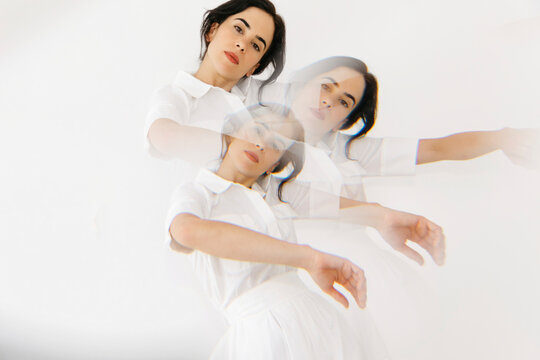Multiple exposure of woman dancing