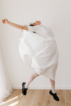 Dancer jumping in studio