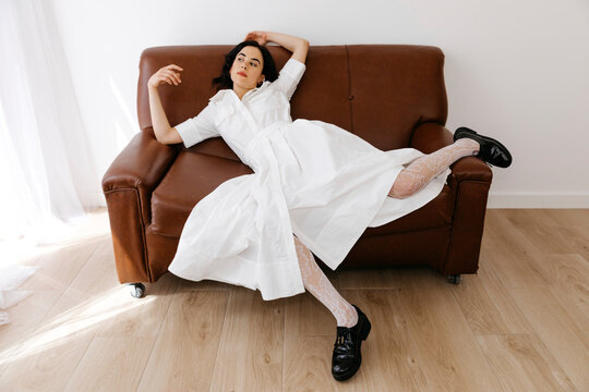 Woman l posing on couch 