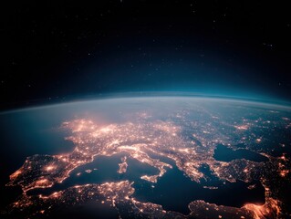 Fototapeta premium Satellite View of Earth at Night Showing Glowing City Lights Across Europe and Middle East for Global Logistics and International Business Background With Copy Space