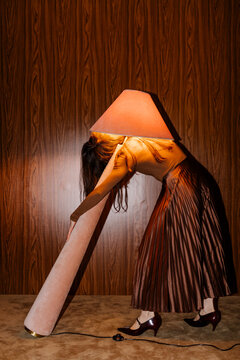 Surreal Lamp Hat Dancer in Retro Room