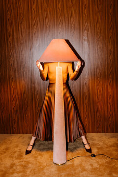Surreal Lamp Head Fashion Pose in Vintage Room