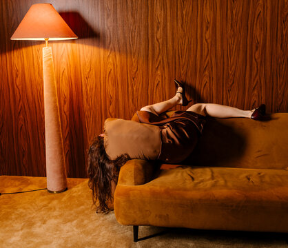 Retro Lounge Scene With Person On Sofa