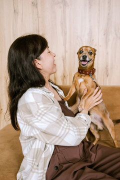 A woman enjoys time spent with her dog