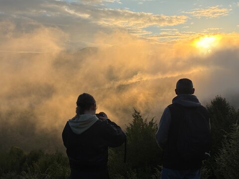 family walking in the mountains
