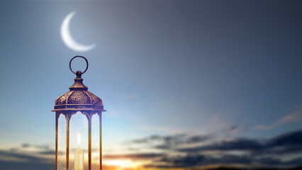 Atmospheric image of a traditional Arabic lantern with a lit candle under a crescent moon at sunset. Perfect for Ramadan Kareem and Eid Mubarak greeting cards and backgrounds © Leo Lintang
