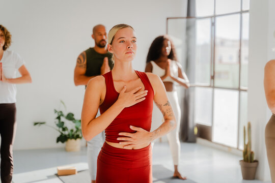 People exercising yoga together