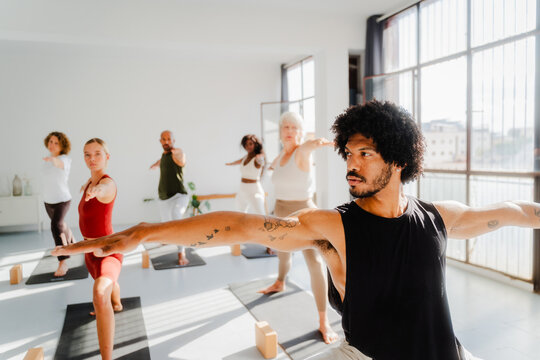 A group of individuals practicing yoga