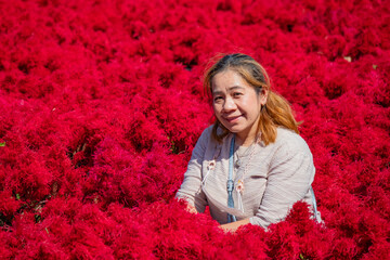 Woman Posing in a Field of Flowers