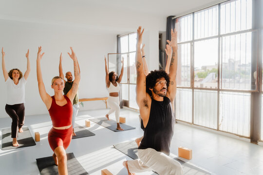 Group yoga training with an instructor